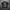 Black t-shirt with car graphic and 'Driven' text on a textured gray background