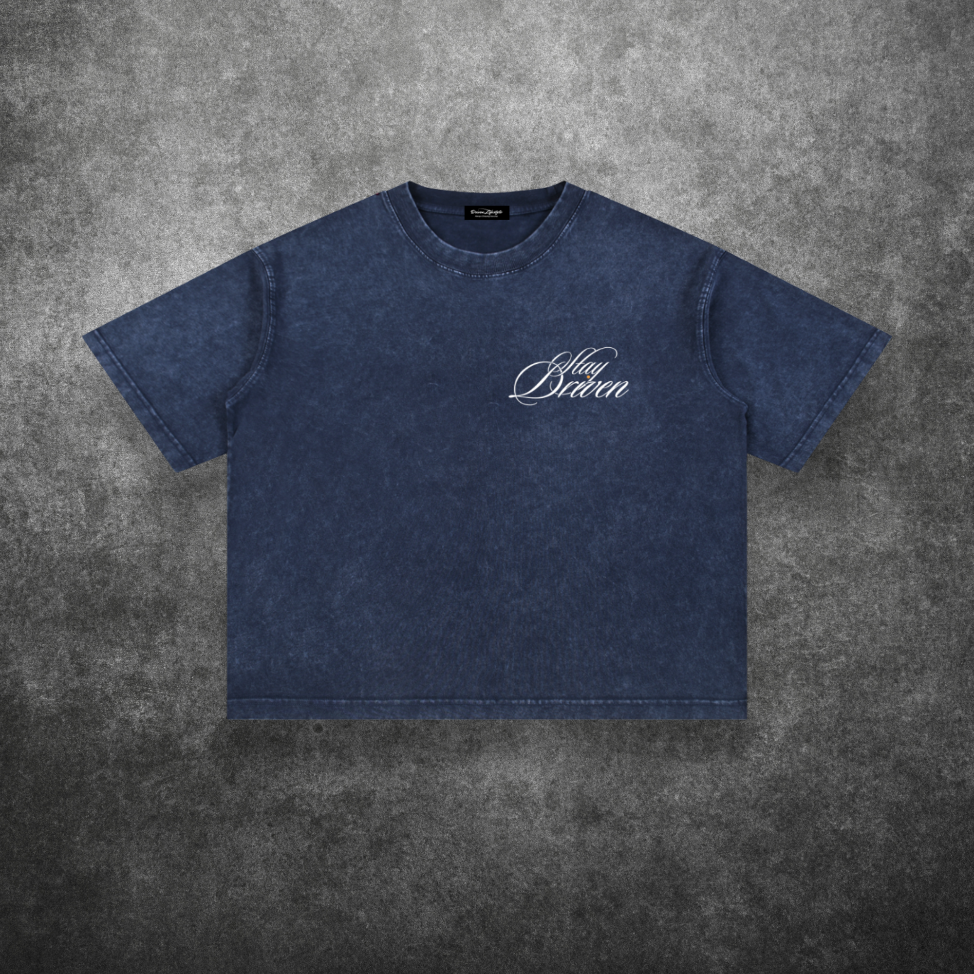Blue t-shirt with white text on a gray textured background