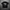 Black t-shirt with graphic design and text on a textured gray background